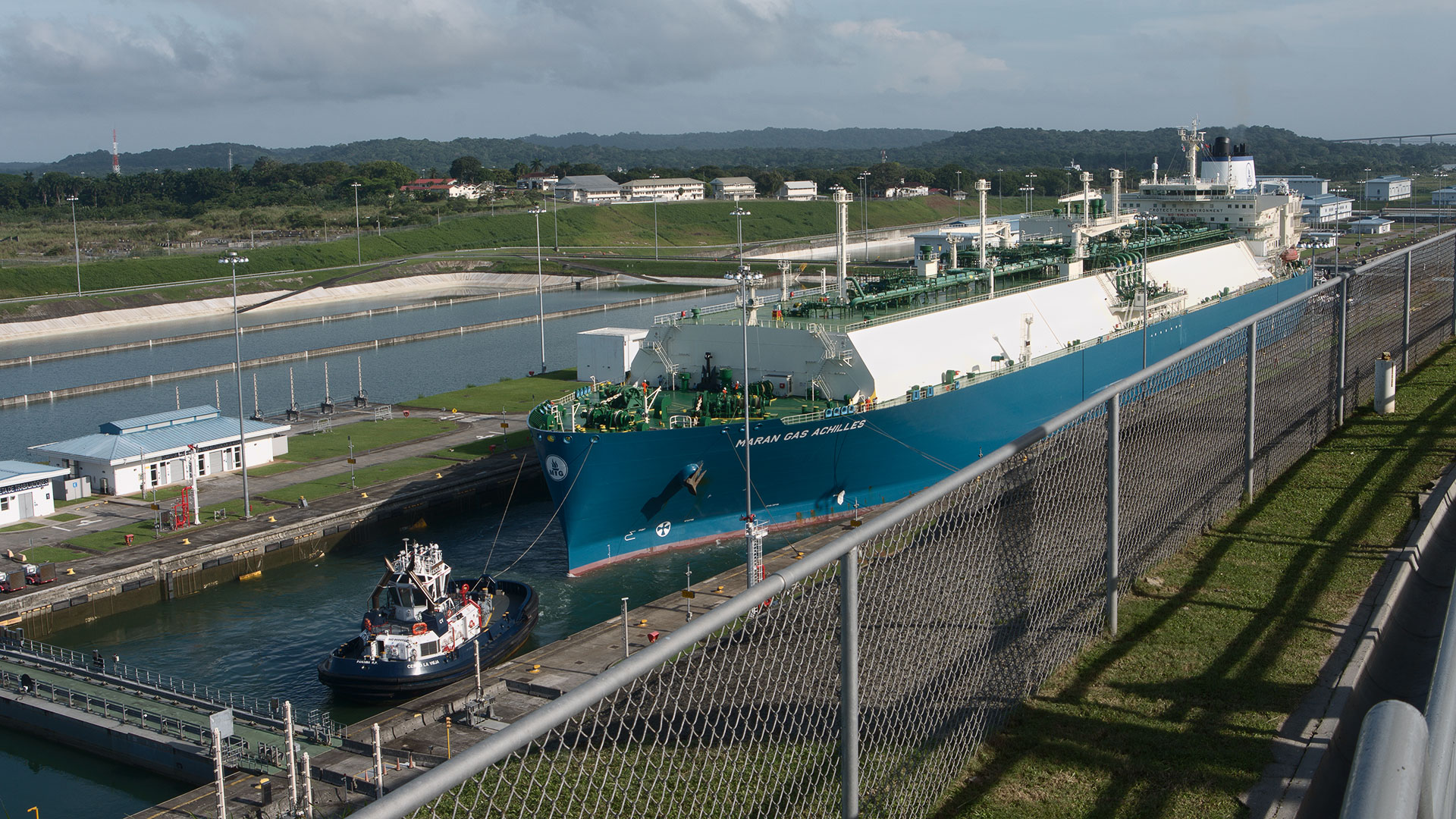a view of a commerical vessel inside the southernmost chamber of Agua Clara Locks, in the Panama Canal.